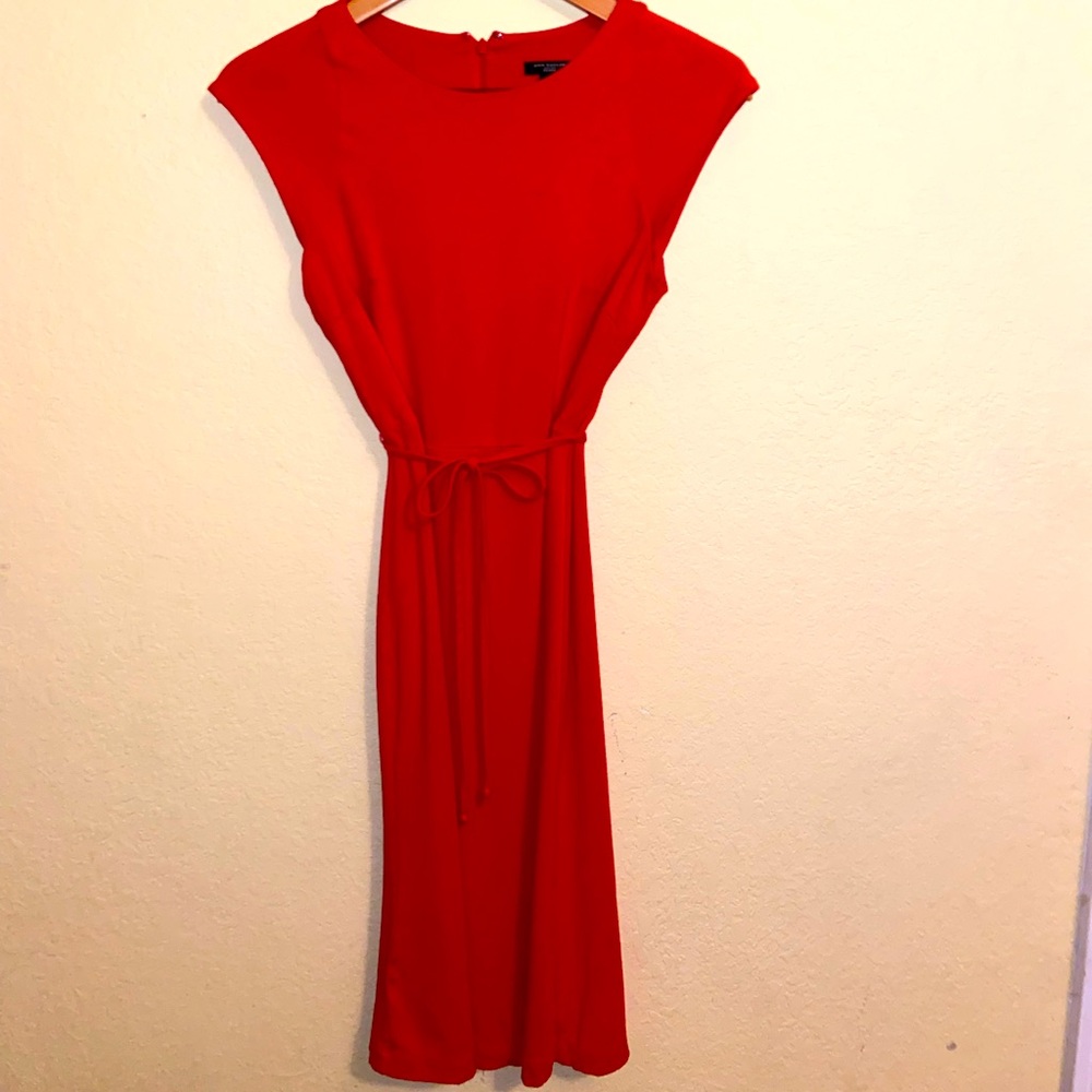 Flattering, sophisticated red dress; perfect for any occasion. Beautiful!